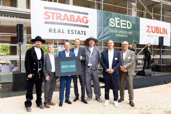 STRABAG Real Estate feiert Richtfest für das SEED in Frankfurt